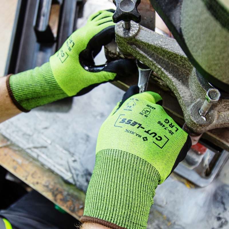 Hi-Vis yellow and black Cut-Less® Korplex® cut resistant glove with an 18-gauge seamless knit, foam nitrile palm, reinforced thumb crotch, and ANSI A4 protection for comfort, grip, and durability.