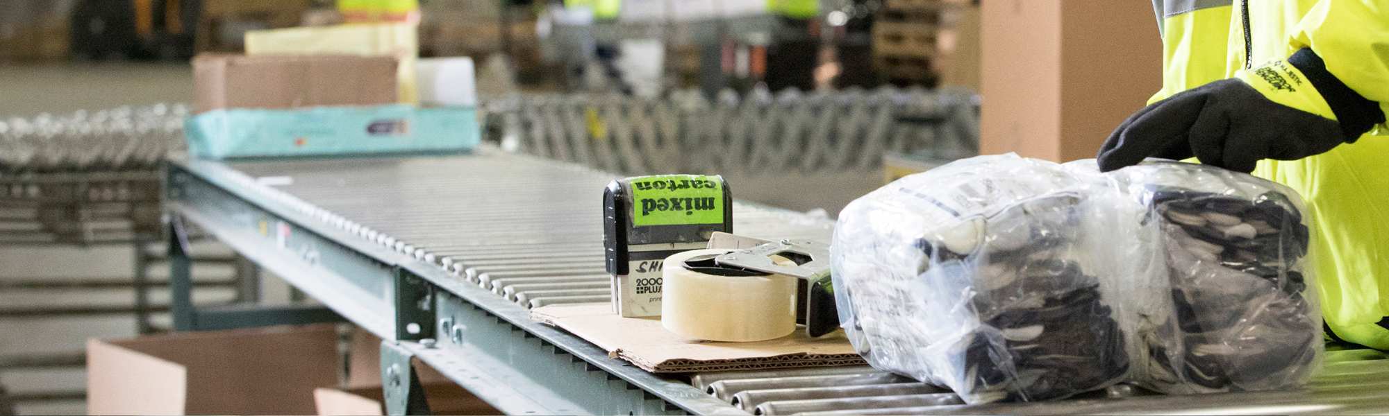 Man boxing, and reviewing order of safety gloves