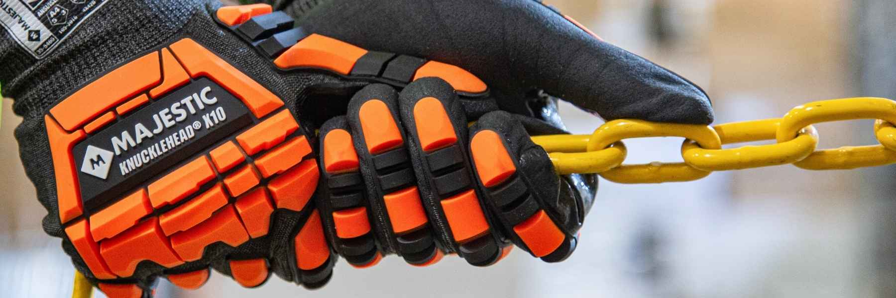Close-up of a person’s hand wearing Majestic's 21242HO Impact-Protective glove.