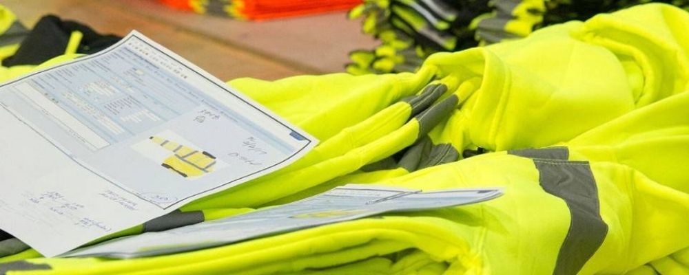 Folded high-visibility apparel packed for delivery